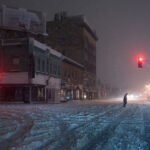 Dark powerless streets. Lake Street and Lyndale Avenue during a heavy snowstorm.