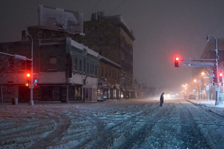 Blizzard takes out power in Minneapolis 4 Dark powerless streets. Lake Street and Lyndale Avenue during a heavy snowstorm.