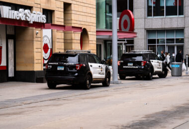 Minneapolis Police squad cars parked outside the Target Store on Nicollet Mall in downtown Minneapolis in April 2023.