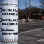A "third precinct survey" sign on a pole in South Minneapolis. The city has been holding community meetings regarding the future of the burned out Minneapolis police third precinct.