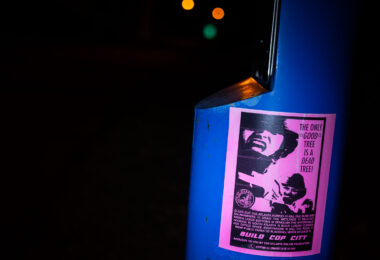 A Cop City flyer seen on the Midtown Greenway in Minneapolis.