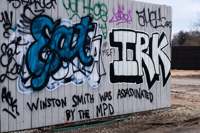 Winston Smith graffiti on Cedar Lake Trail 1 Graffiti reading "Winston Smith was assassinated by the MPD on the Cedar Lake Trail in April 2023.