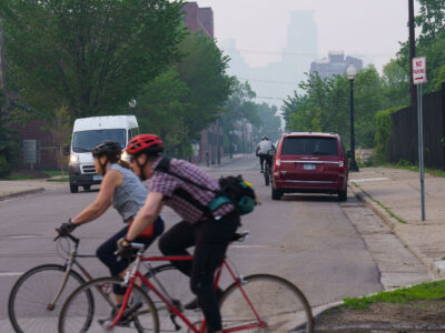 Bikers on Midtown Greenway Amidst Wildfire Smoke, Minneapolis