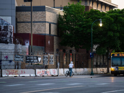 Minneapolis Police 3rd Precinct barricaded with signs, May 2023