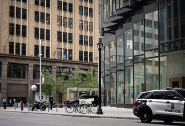Minneapolis Police parked on sidewalks on Nicollet Mall and 8th Street.