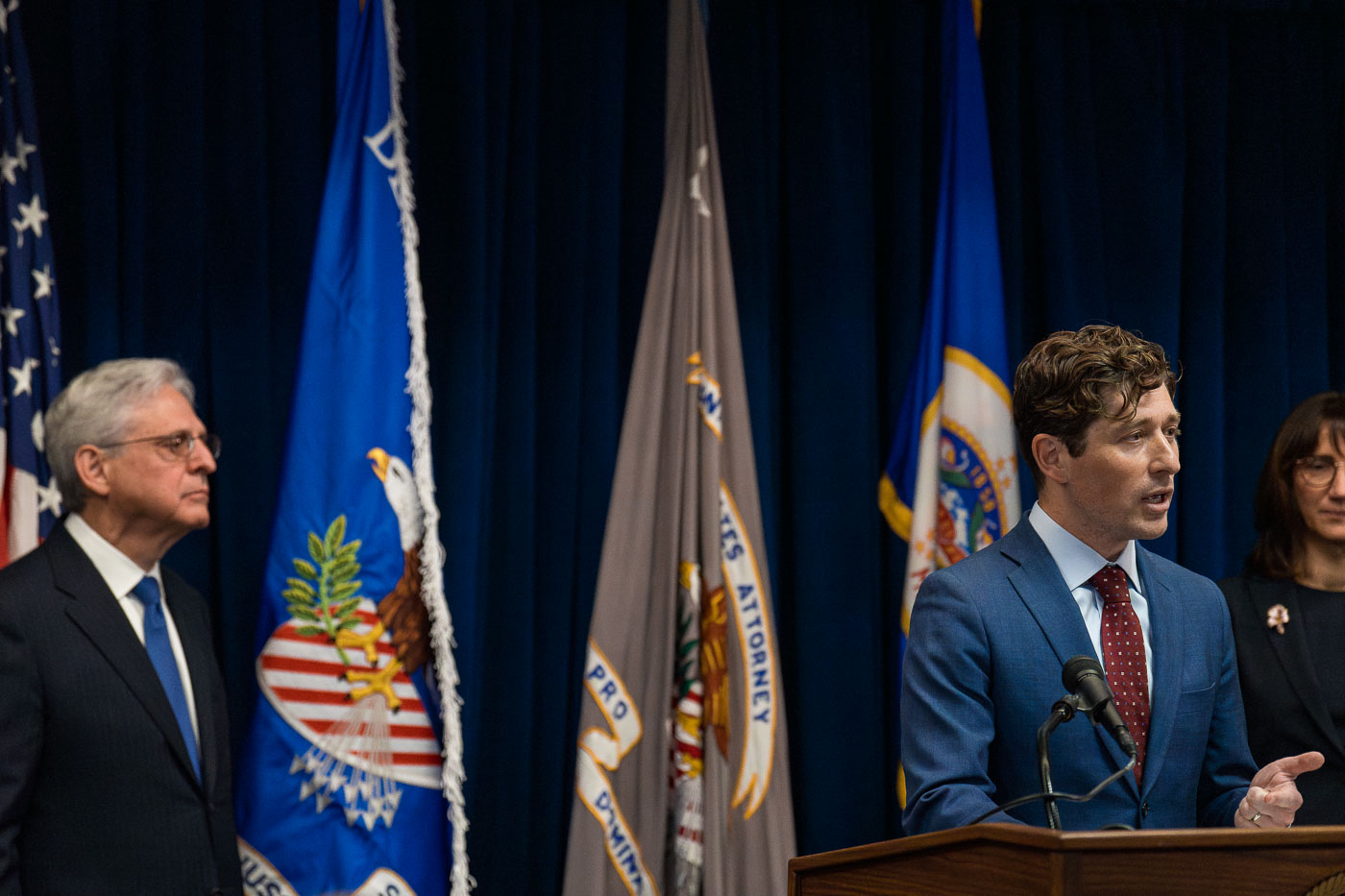 Jacob Frey speaks with Attorney General Merrick Garland watching