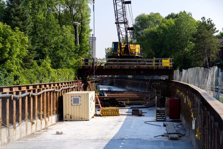 Kenilworth Trail Tunnel Excavation, Southwest LRT, Minneapolis 4 Crawler crane and steel sheet piling at SWLRT tunnel excavation site along Kenilworth Trail, Minneapolis.