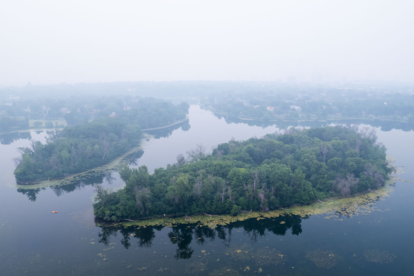 Lake of the Isles with wildfire smoke aerial