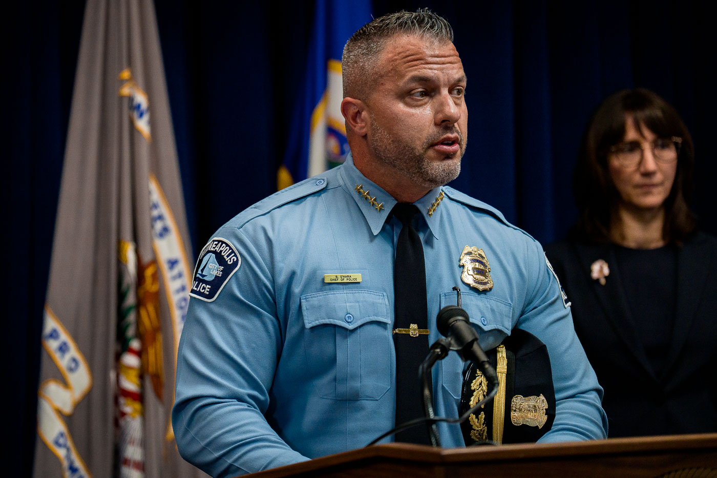 Minneapolis Police Chief Brian Ohara speaks with DOJ