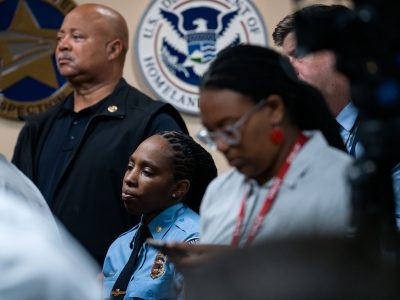 Minneapolis Police Officer at DOJ Investigation Announcement