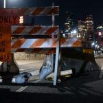 Signage on the Stone Arch Bridge preparing for overnight closures.