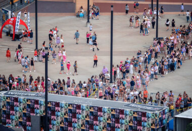 Fans stand in line for merchandise during Taylor Swift's stop at US Bank Stadium in Minneapolis on The Eras Tour, June 23, 2023.