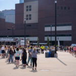 Fans line up for Taylor Swift merchandise the day before a show at US Bank Stadium in Minneapolis on June 22, 2023.