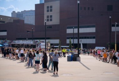 Fans line up for Taylor Swift merchandise the day before a show at US Bank Stadium in Minneapolis on June 22, 2023.