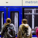Taylor Swift fans wait for a train outsdie the stadium in Minneapolis.