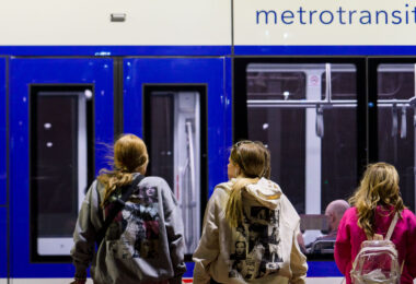 Taylor Swift fans wait for a train outsdie the stadium in Minneapolis.