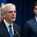 United States Attorney General speaks on it's findings from their investigation into the Minneapolis Police Department on June 16, 2023.Minneapolis Mayor Jacob Frey in the background.