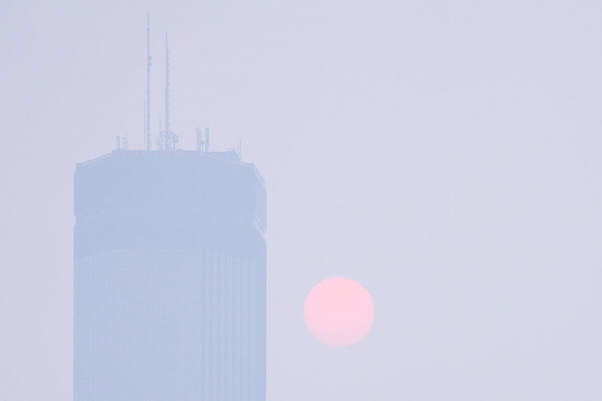 Full Moon hiding behind wildfire smoke in Minneapolis
