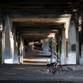 A biker under the Nicollet Ave bridge in Minneapolis.