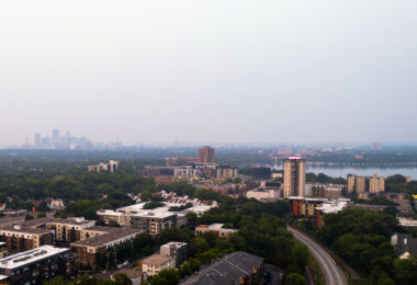 Smokey skies in Minneapolis looking toward downtown. Bde Maka Ska on the right.