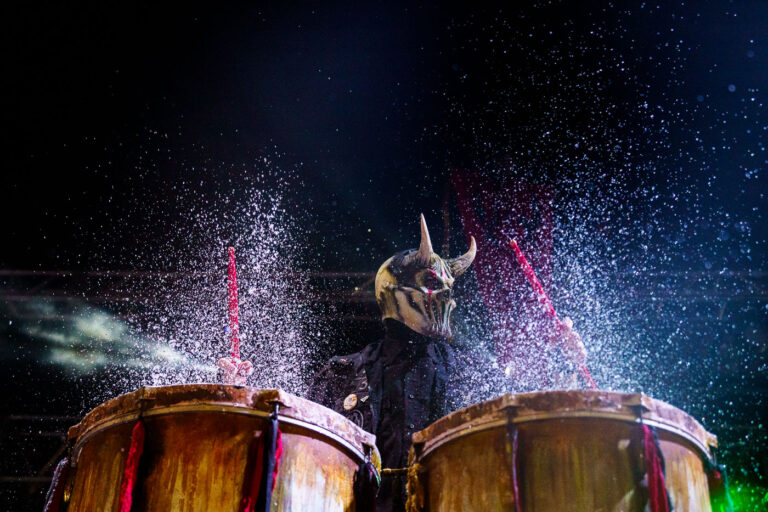 Mushroomhead drummer at Rock Fest, Cadott, WI - July 13, 2023 1 Drummer for the band Mushroomhead performs at Rock Fest in Cadott, Wisconsin, on July 13, 2023. Rock Fest is an annual music festival held in Cadott, Wisconsin, known for featuring a variety of rock and metal bands. The festival has been a significant event in the region's music calendar since its inception, drawing thousands of attendees each year. This performance highlights the energetic and theatrical style often associated with Mushroomhead's live shows.
