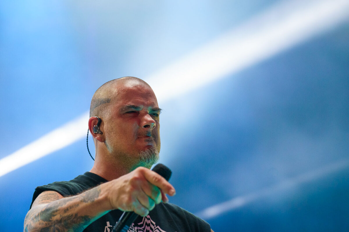 Phil Anselmo of Pantera performs at Rock Fest in Cadott, Wisconsin, on July 13, 2023. Rock Fest is an annual heavy metal music festival held in Cadott, Wisconsin, known for drawing large crowds and featuring prominent bands in the genre. The festival has been a significant event in the Midwestern music calendar since its inception, providing a platform for both established and emerging metal artists. Pantera, a highly influential band in the groove metal subgenre, was a major draw for the 2023 event, continuing their legacy of powerful live performances.