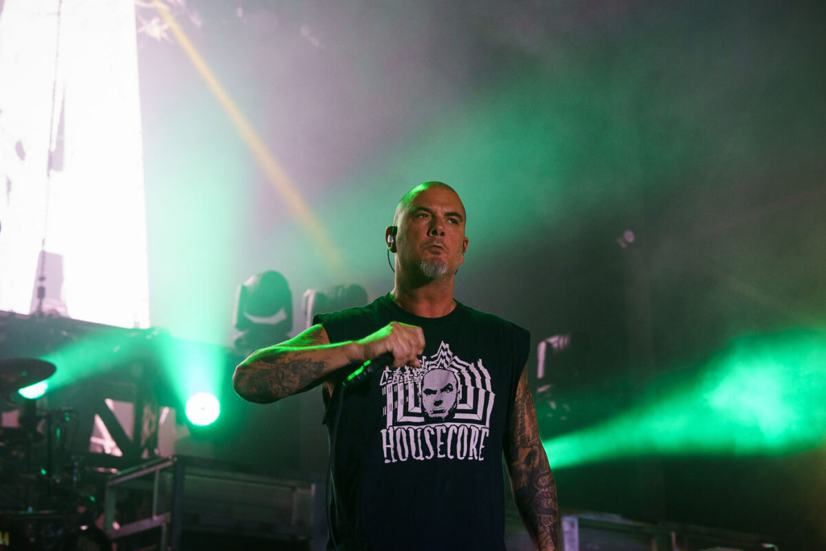 Phil Anselmo, vocalist for Pantera, performs at Rock Fest in Cadott, Wisconsin, on July 13, 2023. Rock Fest is an annual heavy metal music festival held in Cadott, Wisconsin, known for drawing large crowds and featuring prominent bands in the genre. The festival has been a significant event in the regional music calendar since its inception, providing a platform for both established and emerging metal artists.