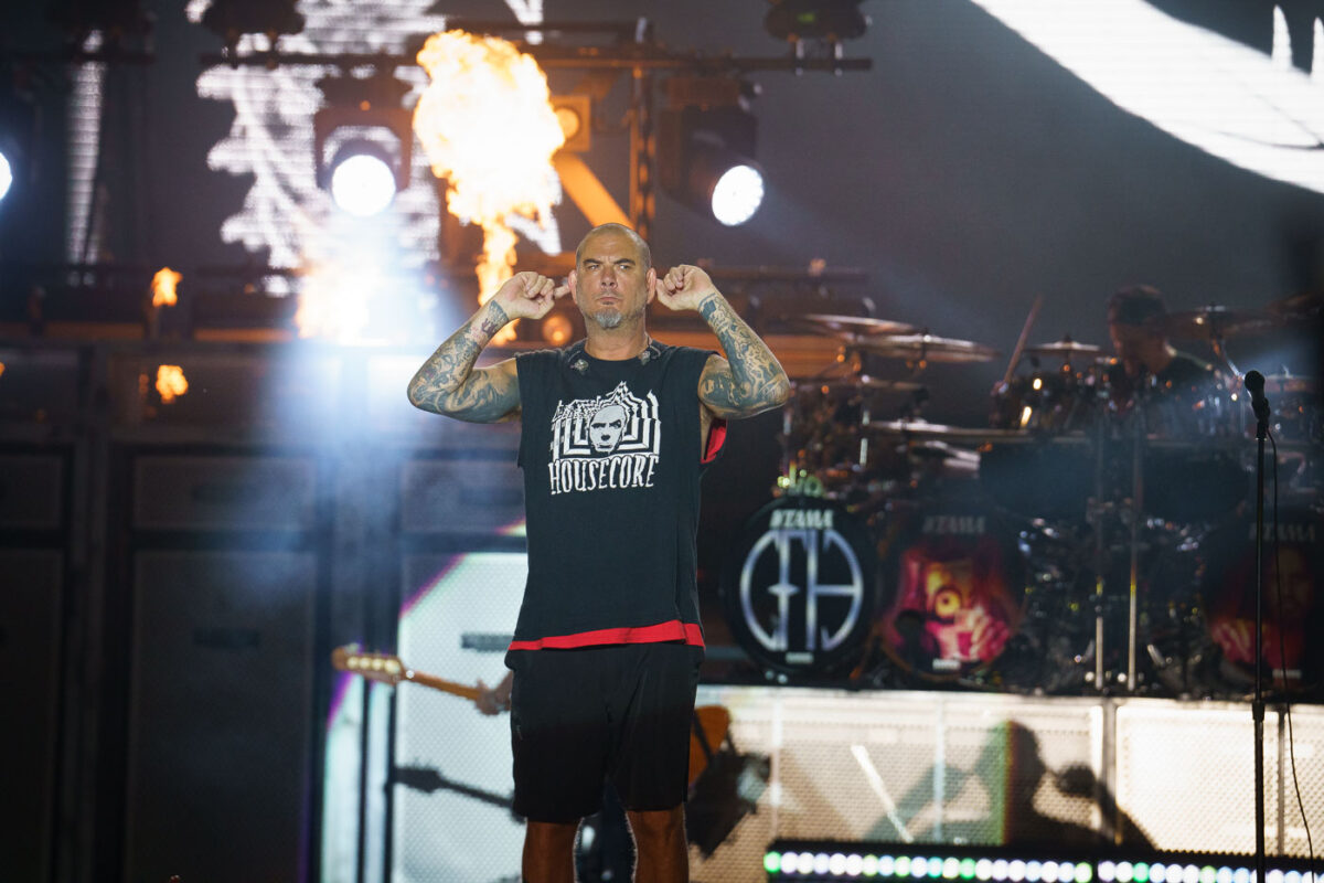 Phil Anselmo of Pantera performs at Rock Fest in Cadott, Wisconsin, on July 13, 2023. Rock Fest is an annual heavy metal music festival held in Cadott, Wisconsin, known for drawing large crowds and featuring prominent bands in the genre. The festival has been a significant event in the Midwest's music calendar since its inception, providing a platform for both established and emerging metal artists. Pantera, a highly influential band in the groove metal subgenre, reunited for performances in 2023, marking a significant moment for their fans.