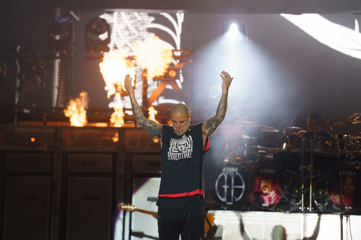 Phil Anselmo of Pantera performs on stage at Rock Fest in Cadott, Wisconsin, on July 13, 2023. Rock Fest is one of the largest heavy metal music festivals in the United States, drawing thousands of attendees annually to the Chippewa Valley. The festival, established in 2004, has become a significant cultural event for the region, showcasing a diverse lineup of established and emerging metal artists. Pantera, a highly influential band in the groove metal genre, was a prominent act at this year's festival.