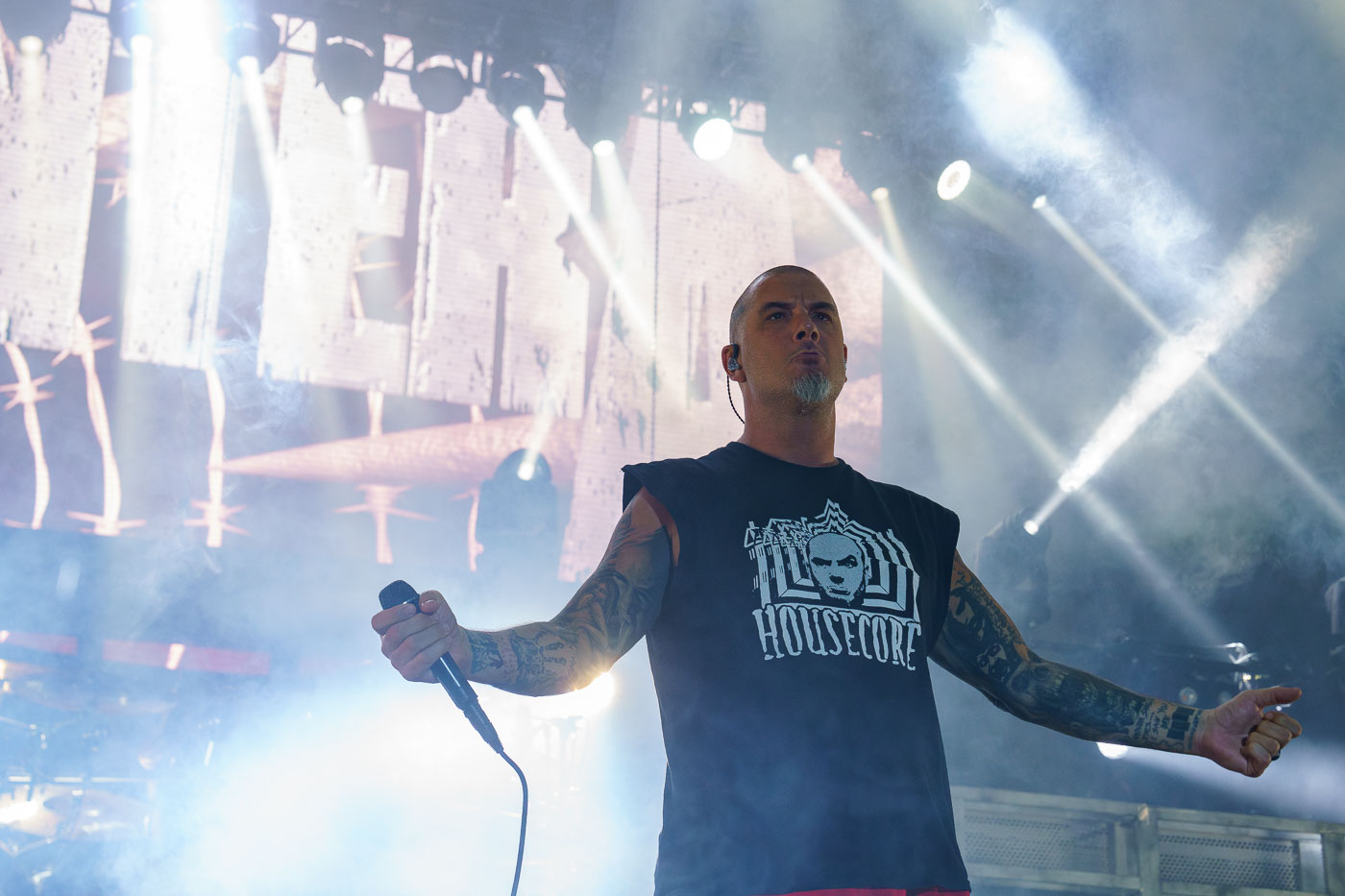 Phil Anselmo, vocalist for the band Pantera, performs at Rock Fest in Cadott, Wisconsin, on July 13, 2023. Rock Fest is an annual heavy metal music festival held in Cadott, Wisconsin, which draws thousands of attendees each year. The festival has a history dating back to 2004 and has featured numerous prominent bands in the rock and metal genres. Pantera, a highly influential band in the groove metal subgenre, reunited for a tour in 2022, marking a significant moment for their fans.