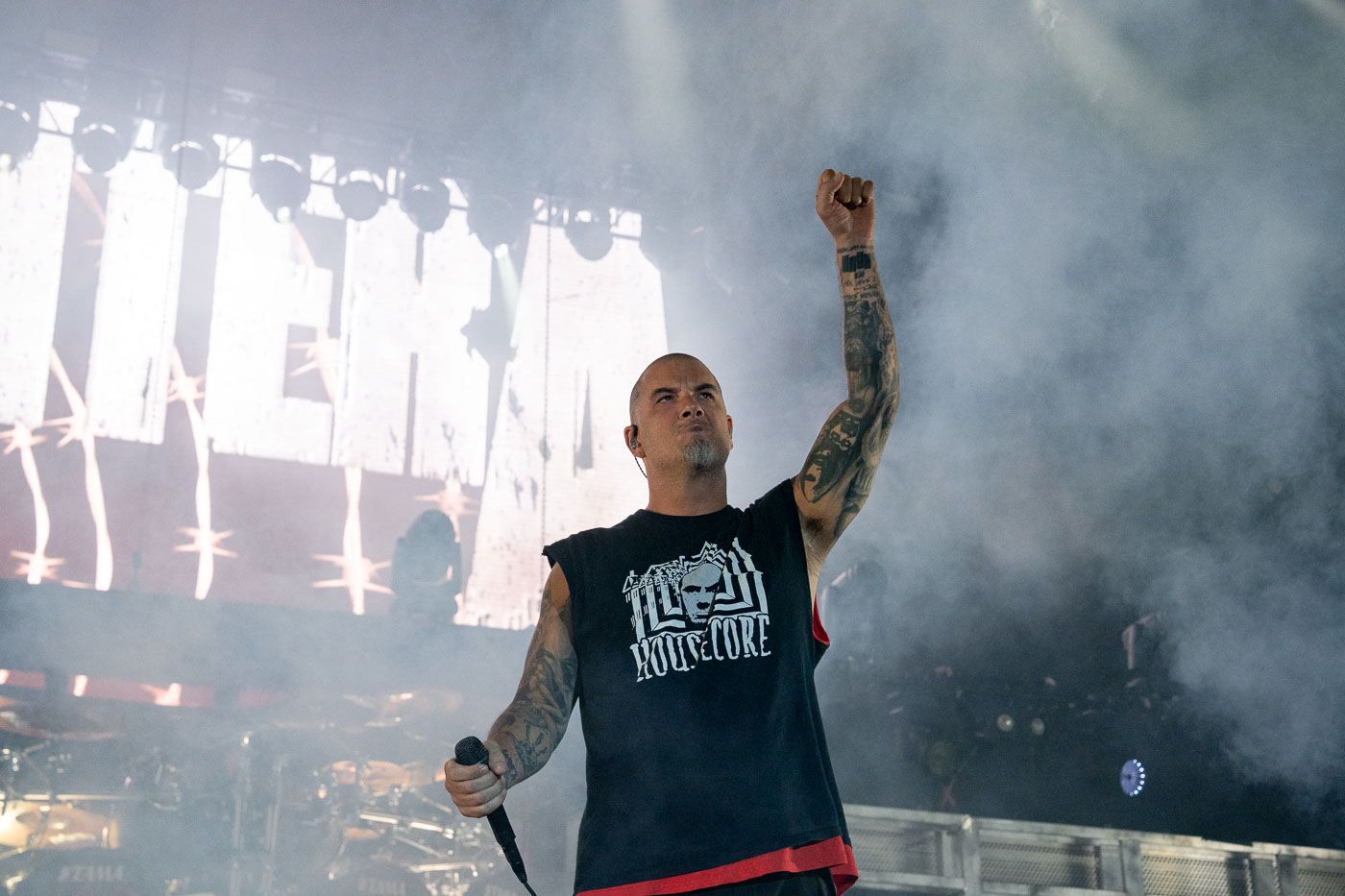 Phil Anselmo, frontman for the band Pantera, performs at Rock Fest in Cadott, Wisconsin, on July 13, 2023. Rock Fest is an annual heavy metal music festival held in Cadott, Wisconsin, which draws thousands of attendees each year. The festival has a long history, dating back to 1994, and has featured numerous prominent bands in the metal genre. This performance marks a significant moment for the band and its fans, as Pantera continues to tour and perform their influential music.