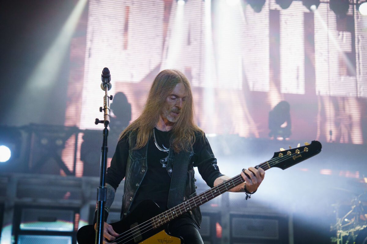 Rex Brown of the band Pantera performs on bass guitar at Rock Fest in Cadott, Wisconsin, on July 13, 2023. Rock Fest is an annual music festival held in Cadott, Wisconsin, known for featuring a variety of rock and metal bands. The festival has been a significant event in the region for many years, drawing fans of heavy music from across the country. Pantera, a highly influential heavy metal band, reunited for a tour in 2023, marking a significant moment for their dedicated fanbase.