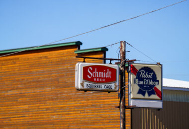 Signs outside the Squirrel Cage bar in Willow River Minnesota.