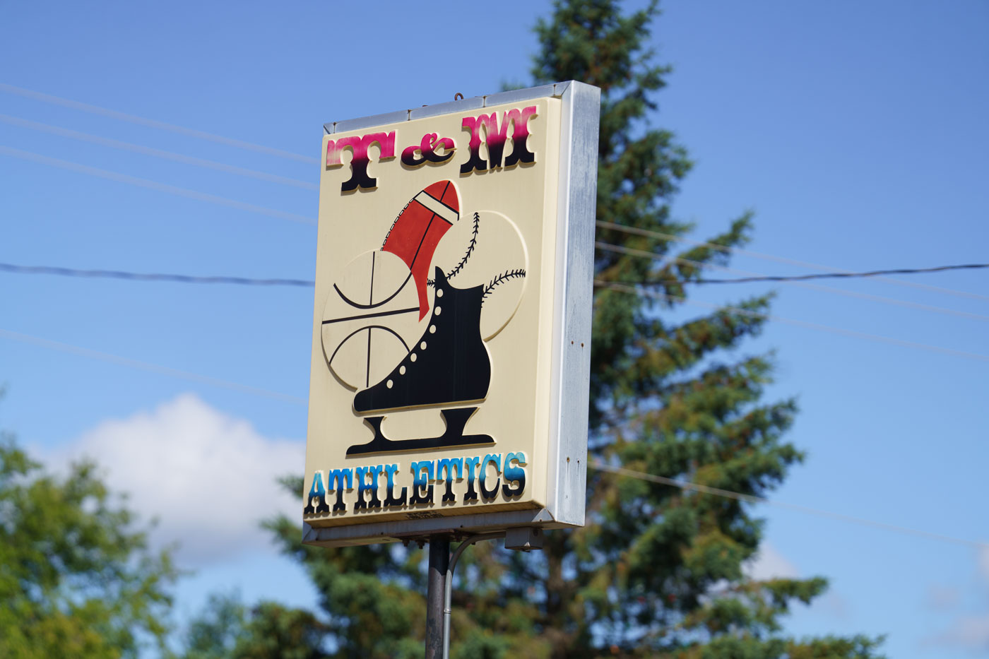 T and M Athletics figure skating sign