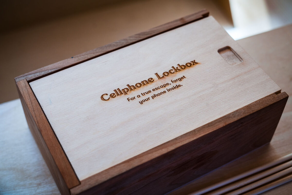 Wooden cellphone lockbox engraved with "Cellphone Lockbox"
