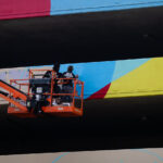 A new mural being painted on the parking garage next to Seven Points Mall at Lake and Girard in Uptown Minneapolis. Winston Smith was killed by law enforcement on June 3, 2021 on the top floor which led to months of protest.