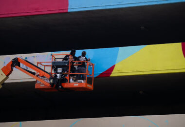 A new mural being painted on the parking garage next to Seven Points Mall at Lake and Girard in Uptown Minneapolis. Winston Smith was killed by law enforcement on June 3, 2021 on the top floor which led to months of protest.