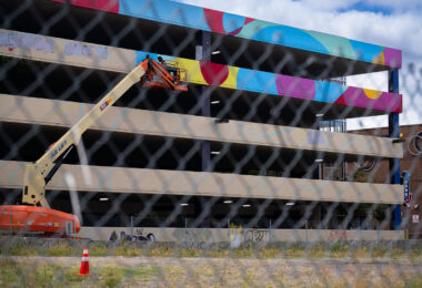 A new mural being painted on the parking garage next to Seven Points Mall at Lake and Girard in Uptown Minneapolis. Winston Smith was killed by law enforcement on June 3, 2021 on the top floor which led to months of protest.