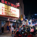 Motorcycles and hot rodders outside the Skyway Theatre in Downtown Minneapolis.