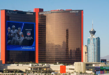 A CBS Sports NFL ad on the side of Resorts World in Las Vegas, Nevada.