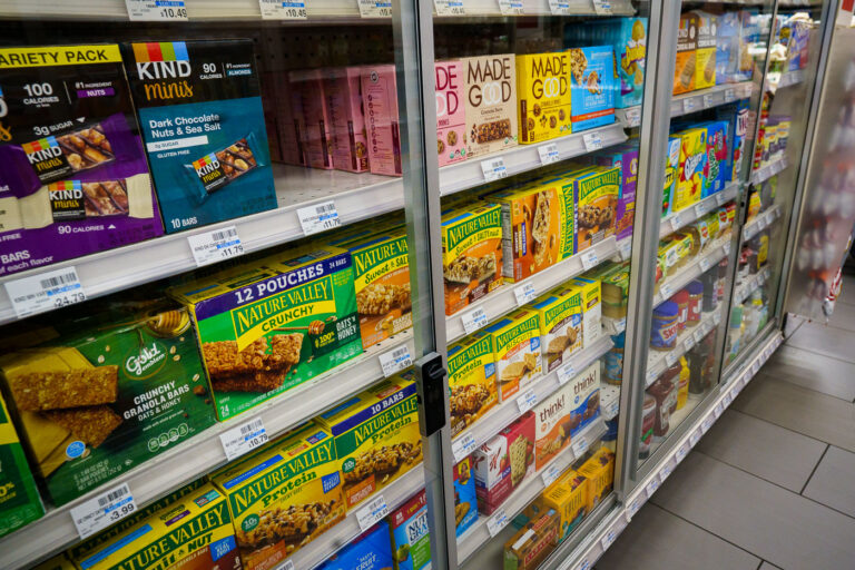 Granola bars behind locked glass cabinets 2 Food locked up behind glass at CVS Las Vegas Strip.