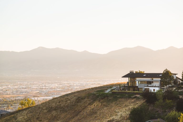 Hillside Home Above Salt Lake Valley, Ensign Peak 1 Modern home perched on a hillside overlooks Salt Lake City and surrounding mountains.