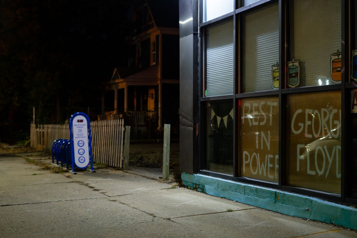 "Rest In Power" and "George Floyd" in a window of a business on Chicago Avenue in South Minneapolis.