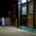 "Rest In Power" and "George Floyd" in a window of a business on Chicago Avenue in South Minneapolis.