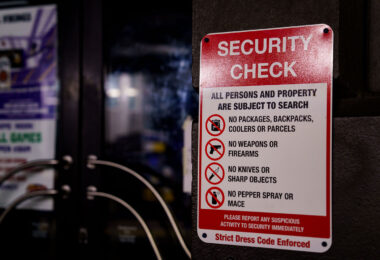 A security check sign outside a bar in downtown Minneapolis.