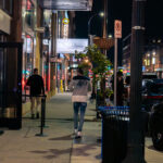 An off duty Minneapolis Police officer works outside Rumba Nightclub on Lake Street in Uptown Minneapolis. October 2023.