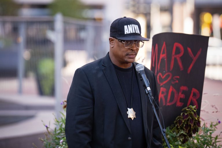 KG Wilson Speaks at Justice Rally, Hennepin County Government Center 4 Man speaking at microphone during justice rally at Hennepin County Government Center in Minneapolis.