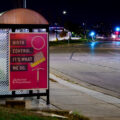 A planned parenthood sign on a bus stop in South Minneapolis. October 2023.