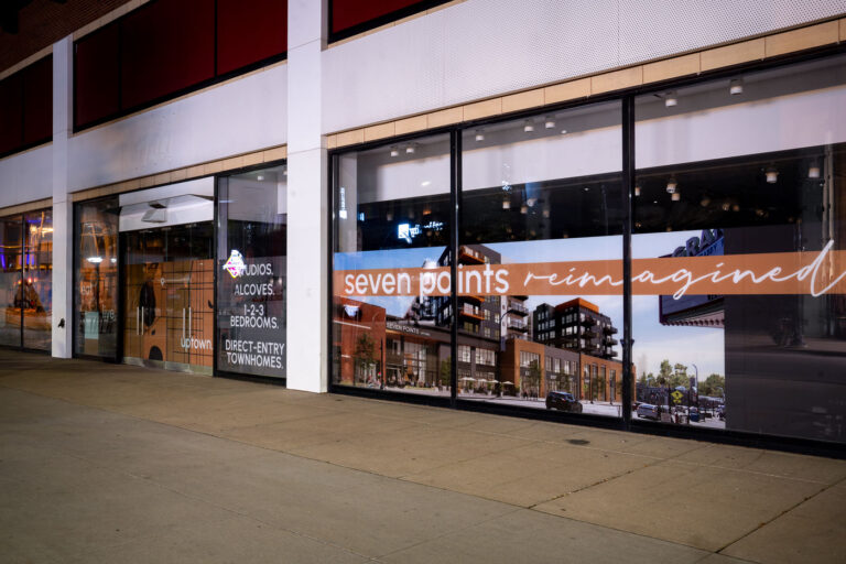 Seven Points Mall "Re-imagined" storefront, Uptown Minneapolis 3 Seven Points Mall in Uptown Minneapolis displays a storefront wrap with an architectural rendering of its future appearance, advertising studios, alcoves, and townhomes.