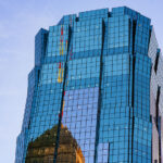 AT&T Tower in Downtown Minneapolis with reflection of the Foshay Tower. November 2023.